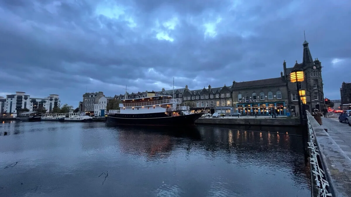 The water of leith at the shore with boat